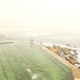 Smoke haze is seen over Bronte ocean bath in Sydney.